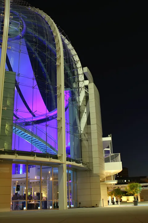 The Rotunda lit in colour at night